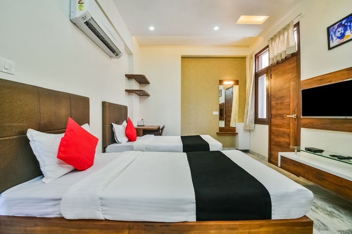 Imagen de la habitación del Hotel Capital O 40000 The Sejour. Foto 11