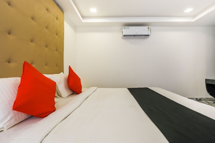 Imagen de la habitación del Hotel Capital O 41974 Casa de Siolim. Foto 10