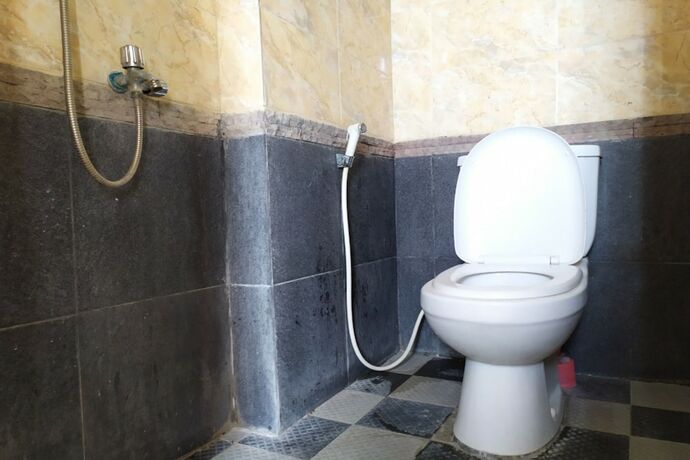 Imagen de la habitación del Hotel Capital O 454 Raising. Foto 5