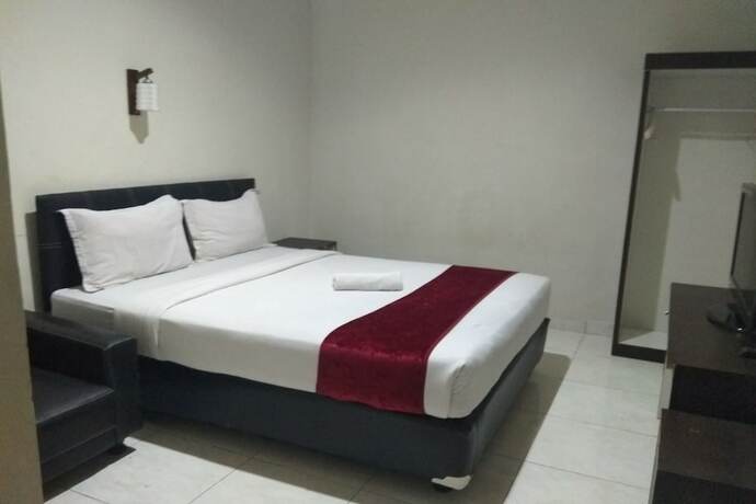Imagen de la habitación del Hotel Capital O 454 Raising. Foto 6