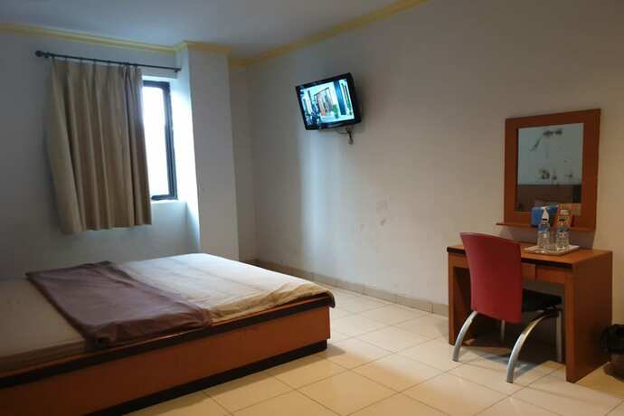 Imagen de la habitación del Hotel Capital O 454 Raising. Foto 9