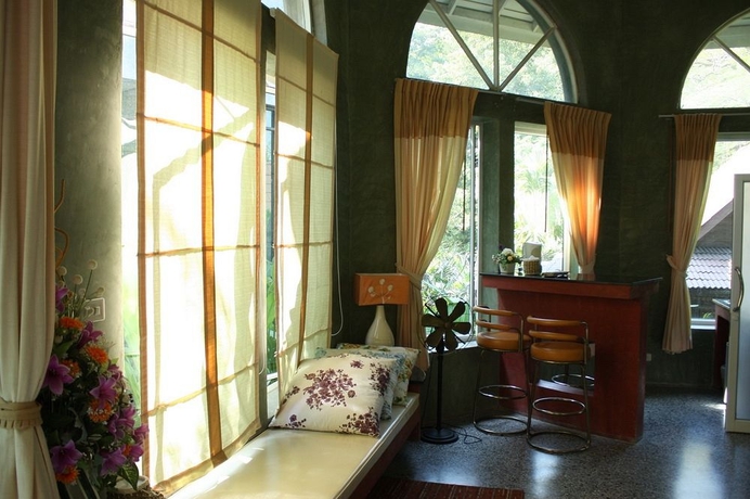 Imagen de los interiores del Hotel Capital O 464 At Nata Chiangmai Chic Jungle. Foto 14