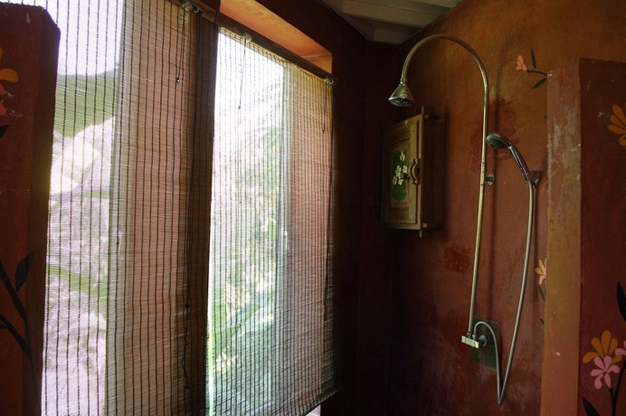 Imagen de la habitación del Hotel Capital O 464 At Nata Chiangmai Chic Jungle. Foto 10