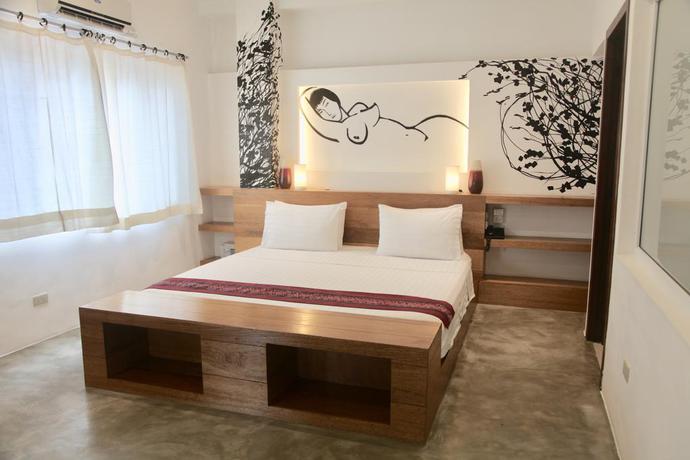 Imagen de la habitación del Hotel Capital O 468 Element Boutique. Foto 5