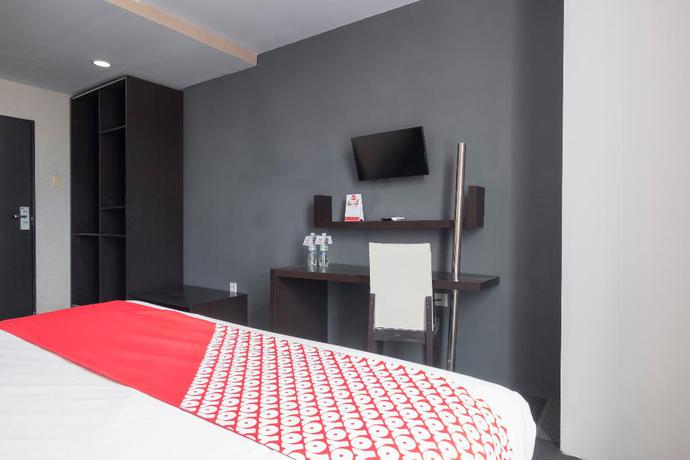 Imagen de la habitación del Hotel Capital O 472 Hotel Asyra. Foto 3