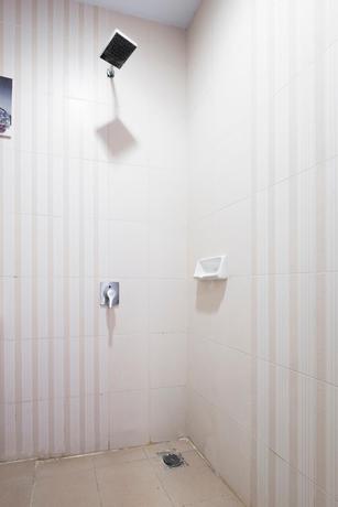 Imagen de la habitación del Hotel Capital O 472 Hotel Asyra. Foto 14