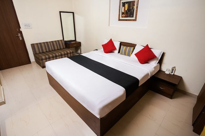 Imagen de la habitación del Hotel Capital O 48482 Tribecca Inn. Foto 6