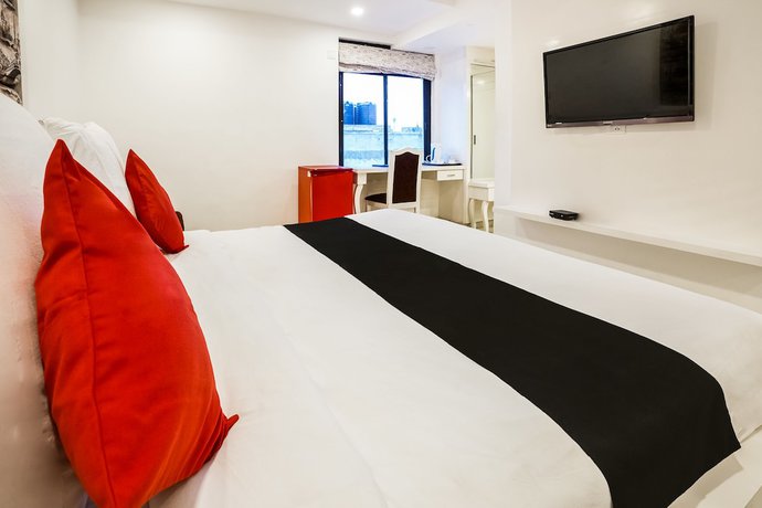 Imagen de la habitación del Hotel Capital O 48482 Tribecca Inn. Foto 12