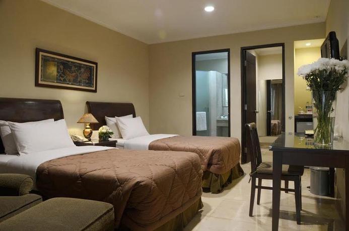 Imagen de la habitación del Hotel Capital O 534 Sriwijaya. Foto 9