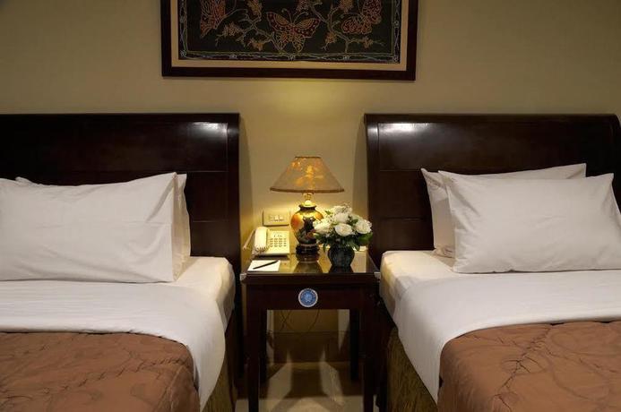 Imagen de la habitación del Hotel Capital O 534 Sriwijaya. Foto 10