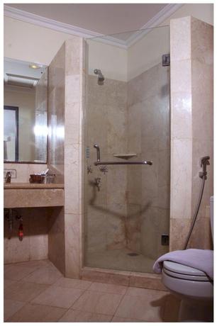 Imagen de la habitación del Hotel Capital O 534 Sriwijaya. Foto 13