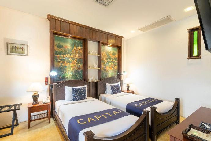 Imagen de la habitación del Hotel Capital O 707 Cheva Gallery. Foto 1