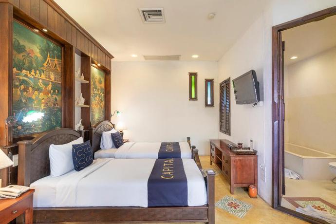 Imagen de la habitación del Hotel Capital O 707 Cheva Gallery. Foto 4