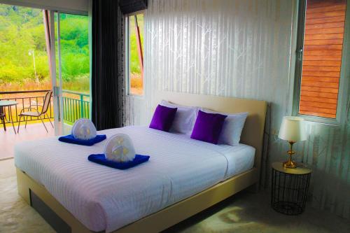 Imagen de la habitación del Hotel Capital O 729 Amantra Lake View Resort. Foto 6