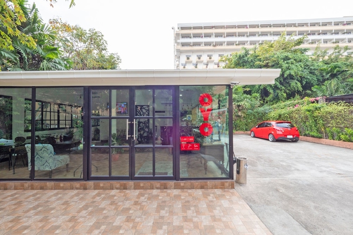 Imagen de los interiores del Hotel Capital O 75379 Sabai Living Pattaya. Foto 8