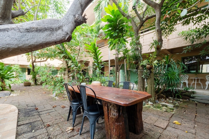 Imagen de los interiores del Hotel Capital O 75379 Sabai Living Pattaya. Foto 17