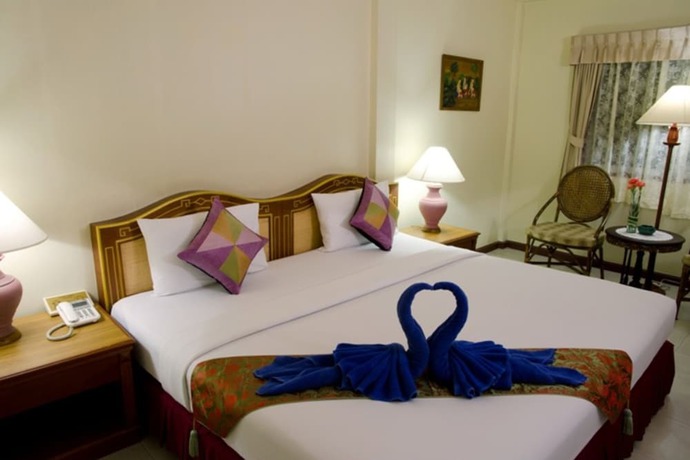 Imagen de la habitación del Hotel Capital O 75395 Sabai Lodge. Foto 4