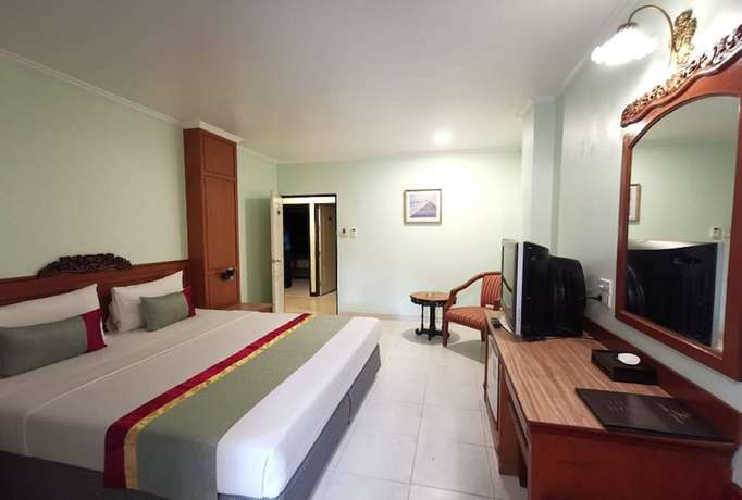 Imagen de la habitación del Hotel Capital O 75395 Sabai Lodge. Foto 8