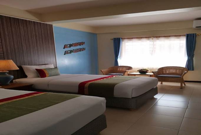 Imagen de la habitación del Hotel Capital O 75395 Sabai Lodge. Foto 9