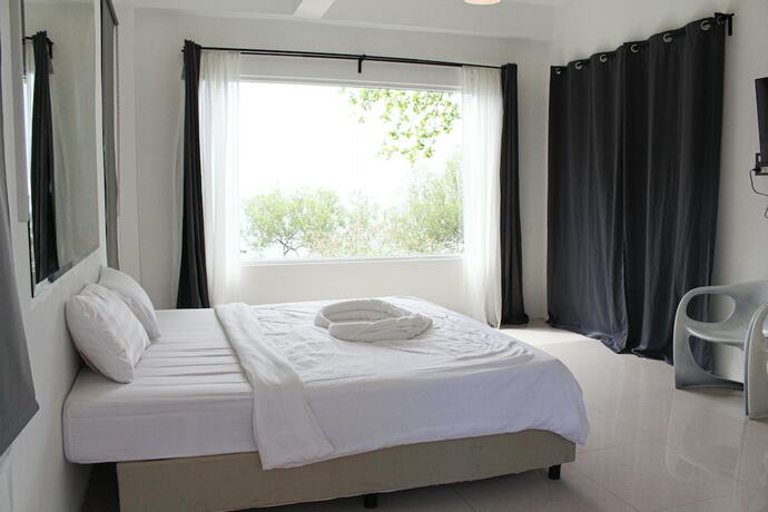 Imagen de la habitación del Hotel Capital O 75411 Navagio Boutique Koh Chang. Foto 13