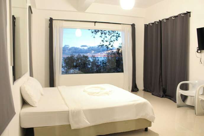 Imagen de la habitación del Hotel Capital O 75411 Navagio Boutique Koh Chang. Foto 19
