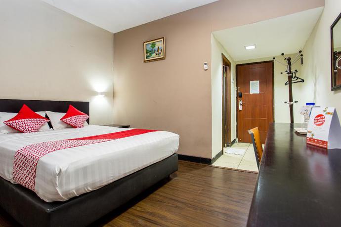 Imagen de la habitación del Hotel Capital O 769 City. Foto 4