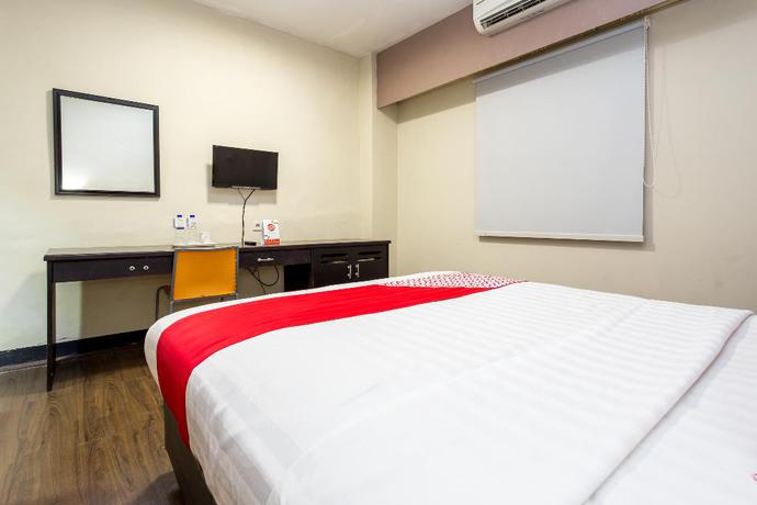 Imagen de la habitación del Hotel Capital O 769 City. Foto 6