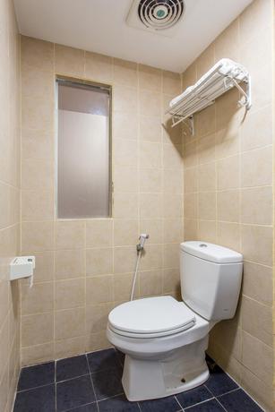 Imagen de la habitación del Hotel Capital O 769 City. Foto 9