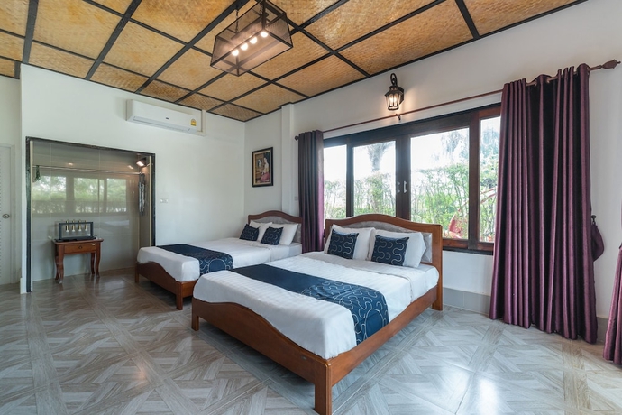 Imagen de la habitación del Hotel Capital O 805 Suan Palm Farm Nok Resort. Foto 4