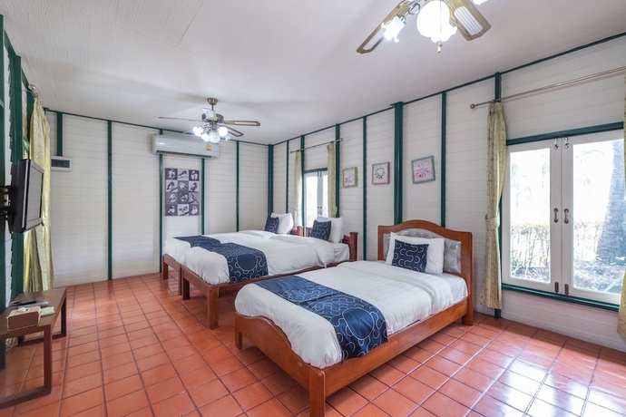 Imagen de la habitación del Hotel Capital O 805 Suan Palm Farm Nok Resort. Foto 6