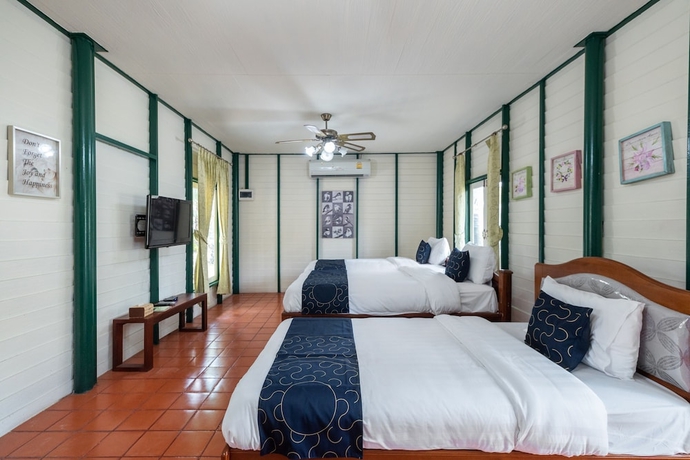 Imagen de la habitación del Hotel Capital O 805 Suan Palm Farm Nok Resort. Foto 7