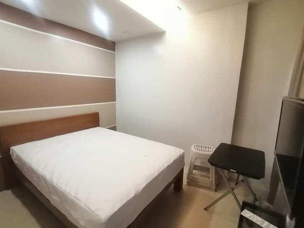 Imagen general del Hotel Capital O 811 Tri A\'s Building. Foto 2
