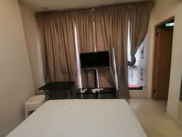 Imagen general del Hotel Capital O 811 Tri A\'s Building. Foto 5