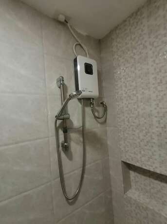 Imagen general del Hotel Capital O 811 Tri A\'s Building. Foto 8