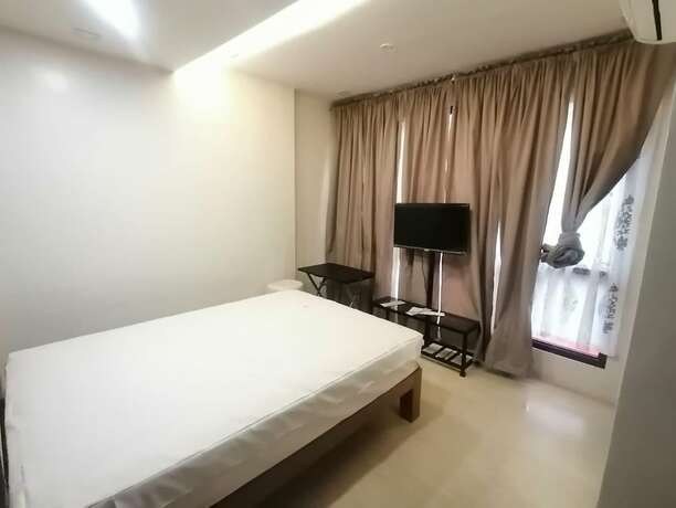 Imagen general del Hotel Capital O 811 Tri A\'s Building. Foto 13