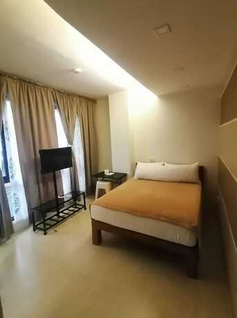 Imagen general del Hotel Capital O 811 Tri A\'s Building. Foto 15
