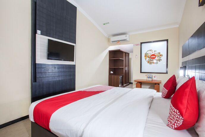 Imagen de la habitación del Hotel Capital O 887 Green Hill And Convention Center. Foto 11