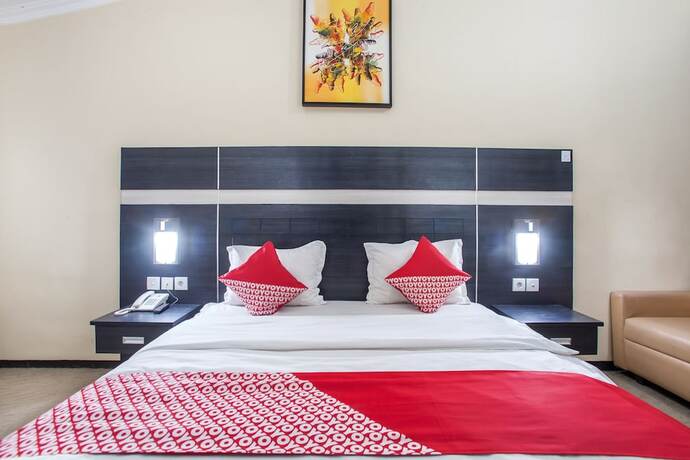 Imagen de la habitación del Hotel Capital O 887 Green Hill And Convention Center. Foto 12