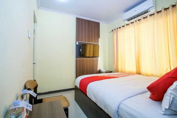 Imagen general del Hotel Capital O 887 Green Hill And Convention Center. Foto 4