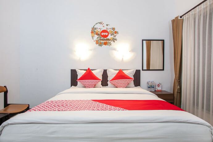 Imagen de la habitación del Hotel Capital O 887 Green Hill And Convention Center. Foto 14