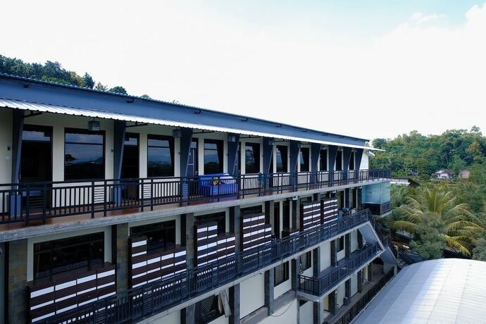 Imagen general del Hotel Capital O 887 Green Hill And Convention Center. Foto 6