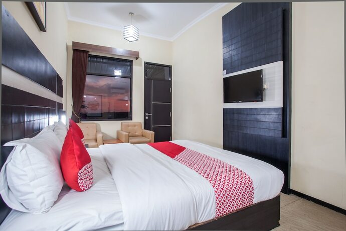 Imagen de la habitación del Hotel Capital O 887 Green Hill And Convention Center. Foto 15