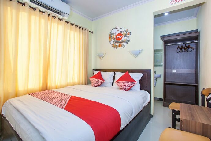 Imagen de la habitación del Hotel Capital O 887 Green Hill And Convention Center. Foto 16