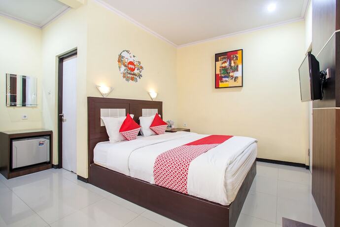 Imagen de la habitación del Hotel Capital O 887 Green Hill And Convention Center. Foto 18