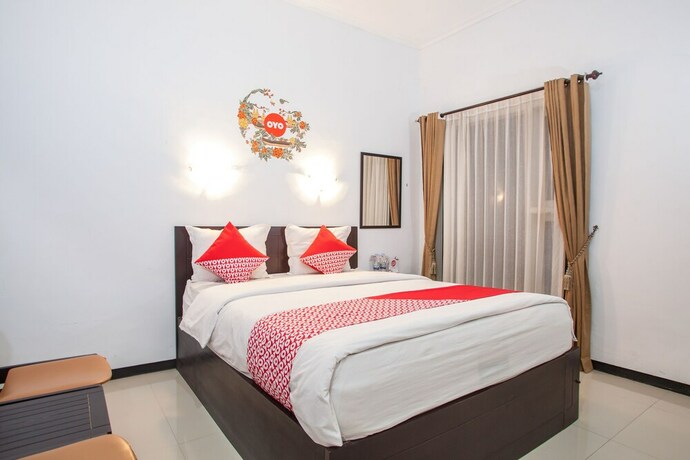 Imagen de la habitación del Hotel Capital O 887 Green Hill And Convention Center. Foto 19