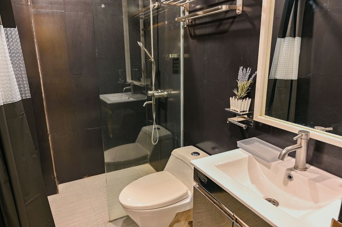 Imagen de la habitación del Hotel Capital O 890 Nami Tagaytay. Foto 2