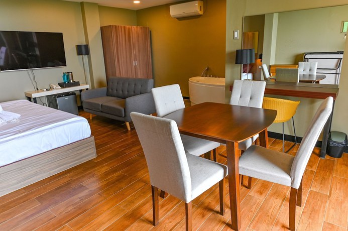 Imagen de la habitación del Hotel Capital O 890 Nami Tagaytay. Foto 3
