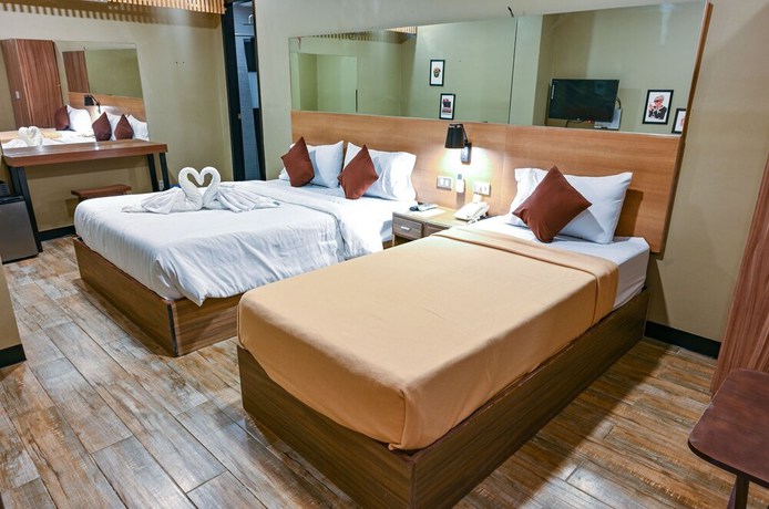 Imagen de la habitación del Hotel Capital O 890 Nami Tagaytay. Foto 10