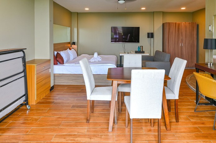 Imagen de la habitación del Hotel Capital O 890 Nami Tagaytay. Foto 11