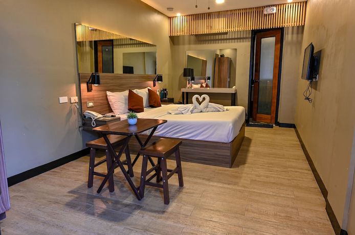 Imagen de la habitación del Hotel Capital O 890 Nami Tagaytay. Foto 12
